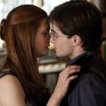 Ginny and Harry kiss.