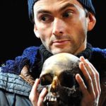 David Tennant holding a skull