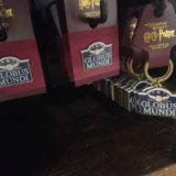 Globus Mundi keychain and pin