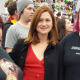 Michele, Bonnie Wright, and Aimee at Wizard World Portland 2018, during a photograph opportunity on the main show floor.