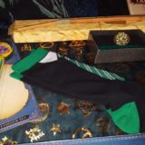 “Harry Potter” pen, House socks, Ron’s broken wand, Fawkes print
