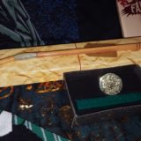 House socks, Ron’s broken wand, Fawkes print, House wax stamp