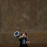 Professor Flitwick is featured with his bullhorn? Wizarding choir practice must be getting a little too loud…