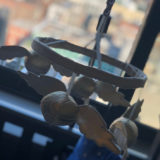 A “Harry Potter” mobile for a child’s crib, featuring Golden Snitches