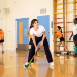 Emma Watson demonstrates her field hockey skills.