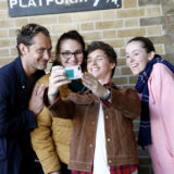 Redmayne snaps a selfie of Law and two select fans.