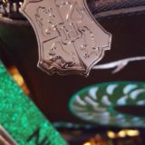 Danielle Nicole Slytherin pouch Hogwarts-stamped zipper pull