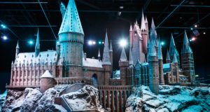 Scale model of Hogwarts Castle covered in snow