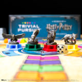 Trivial Pursuit: World of Harry Potter Ultimate Edition game pieces featuring each House mascot and die