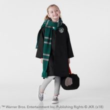 The adorable Slytherin costume comes with the House cloak, tie, and scarf.