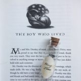 Harry Potter’s Pensieve vial lying on top of the first page of Chapter 1, “The Boy Who Lived,” in “Harry Potter and the Sorcerer’s Stone”