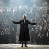 Grindelwald is holding his mass meetings in an amphitheater beneath the Lestrange mausoleum.