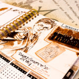 August 2019 page from the Harry Potter weekly planner featuring a sketch of Harry Potter and Dumbledore’s Army signatures