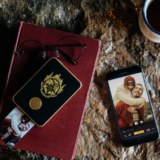 Harry Potter Magic Photo and Video Printer in black, showing a photo having been sent from a cell phone to the printer