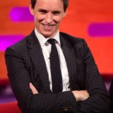 Eddie Redmayne sits on the couch on “The Graham Norton Show”.