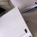 Inside a Dark Arts lined journal, showing the Dark Mark