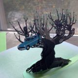Pop-Up Whomping Willow Card from Insight Editions, showing the flying Ford Anglia stuck in the branches of the Whomping Willow