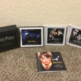 “Harry Potter: The John Williams Soundtrack Collection”, showing the box and all disc cases
