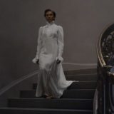 Laurena Kama on the stairs after the special effects have been added.