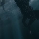 Credence’s aunt dives for the baby after special effects have been added.