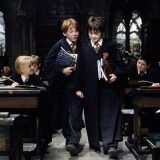 Harry and Ron run late to class.