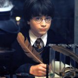 Harry takes notes on his first day of Potions class.