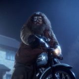 Hagrid lands his motorbike on Privet Drive.