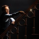 Harry Potter (Gareth Reeves) casts the Wand-Lighting Charm as he peers into the darkness.