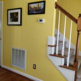 My new Classic Stills print hanging on the wall, right beside my cupboard under the stairs