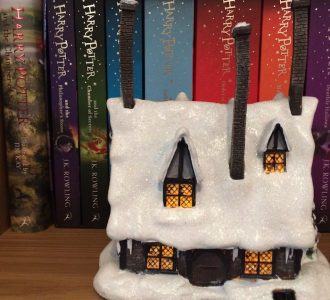 The chimneys attach to the model easily, and they make the pub look even more magical.