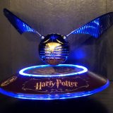 Harry Potter GOLDEN SNITCH™ on base, showing the “Harry Potter” logo design