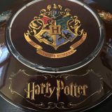 Illuminated base featuring the Hogwarts crest