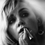 “PIBE Magazine” – Evanna Lynch applying lipstick. Credit: Jason Hetherington/PIBE Magazine