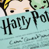 ConQuest Charms, close-up Draco and Nagini with Harry Potter logo