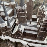 “HOGWARTS™” School of Witchcraft and Wizardry from The Bradford Exchange, view from the top showing the snow-covered roof of the Great Hall and surrounding towers and turrets