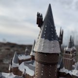 “HOGWARTS™” School of Witchcraft and Wizardry from The Bradford Exchange, detailed view of the snow-covered tower