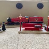 “HOGWARTS EXPRESS™” from The Bradford Exchange with Hogsmeade carolers and train station bench