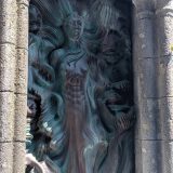 The beautiful image of a merperson greets you before you enter the ruins.