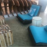 In keeping with the theme, lobby seating is white and bright blue.