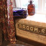 Enchantment Chamber Broom Street sign detail on brick windowsill