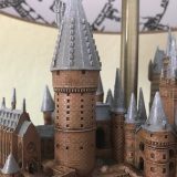 Harry Potter Hogwarts Lamp from The Bradford Exchange: close-up of the details of one of the towers, including multiple windows and visible bricks