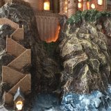 Harry Potter Hogwarts Lamp Illuminated Base: close-up view of the bottom portion of the front of the castle, including path to the lake and bridge, with the windows illuminated