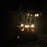 Harry Potter Hogwarts Lamp Illuminated Base: view from the front with the base illuminated and the lights off