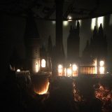 Harry Potter Hogwarts Lamp Illuminated Base: front view of the Hogwarts castle sculpture base with the windows illuminated and the lights off