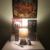 Harry Potter Hogwarts Lamp from The Bradford Exchange: pictured with other Harry Potter collectibles and books, Marauder’s Map lampshade illuminated
