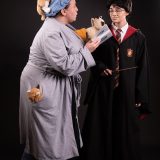 Mrs. Figg tries to warn a skeptical Harry.