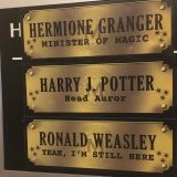 Harry’s, Ron’s, and Hermione’s Ministry of Magic nameplates