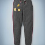 The Mini Boden Transfiguration Sequin Joggers in gray come with a drawstring waist and design featuring Harry Potter’s iconic glasses and lightning bolt scar. They retail at £26.