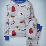 The Mini Boden Harry Potter Long John Pyjamas in gray feature all-over images of Quidditch-related items, including a Quaffle flying through the hoop, a Golden Snitch, a Quidditch Cup, and more. The top-and-bottom set retails at £24.