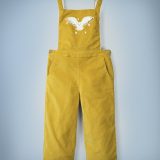 The Mini Boden Hedwig Dungarees in mustard yellow feature a design of Harry Potter’s beloved owl flying through the stars on the breast of the overalls. They retail at £40.